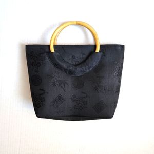 Black silk tote with bamboo handles